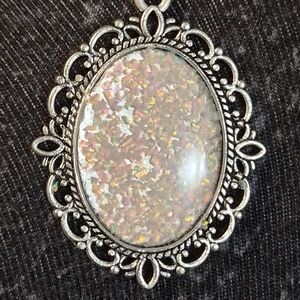 Vintage-Inspired Silver Brooch with Opal Accents